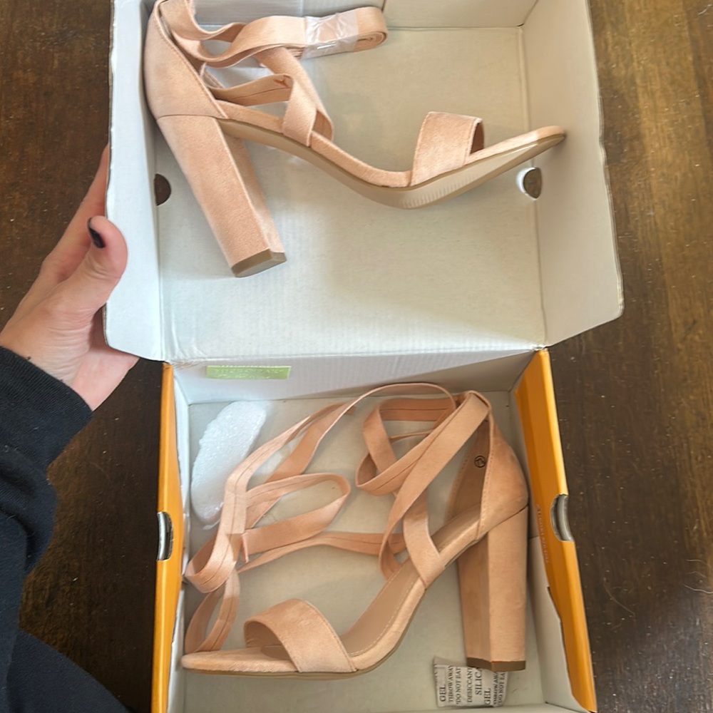 Brand new 7.5 heels. Light pink that tie into a bow on your ankle